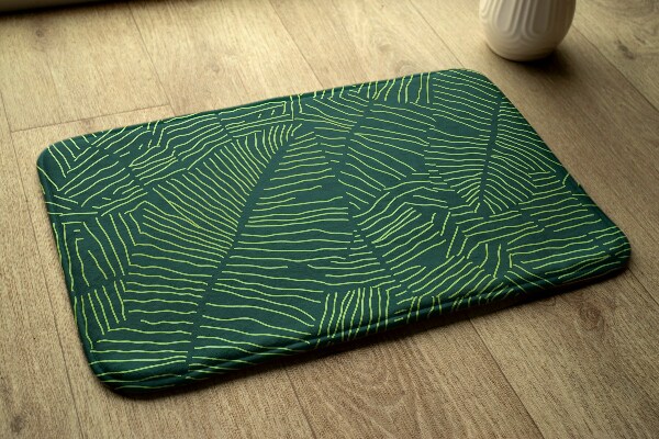 Vloerkleed Groene bladeren met een lineair patroon